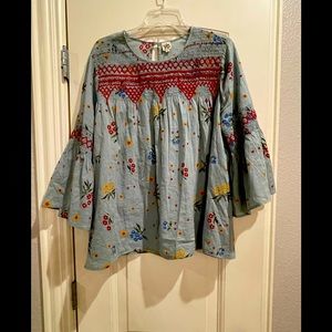 Ivy Jane bell sleeve blouse with smocking detail.